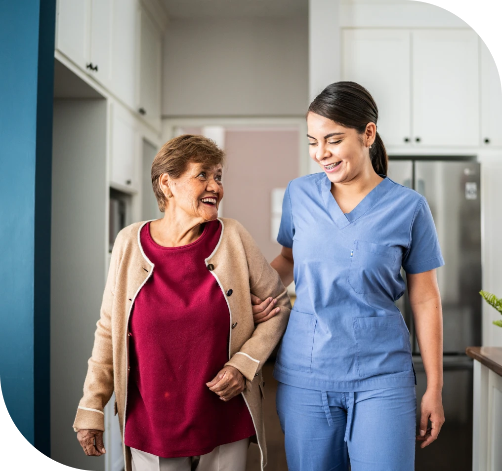 Elderly woman assisted by nurse